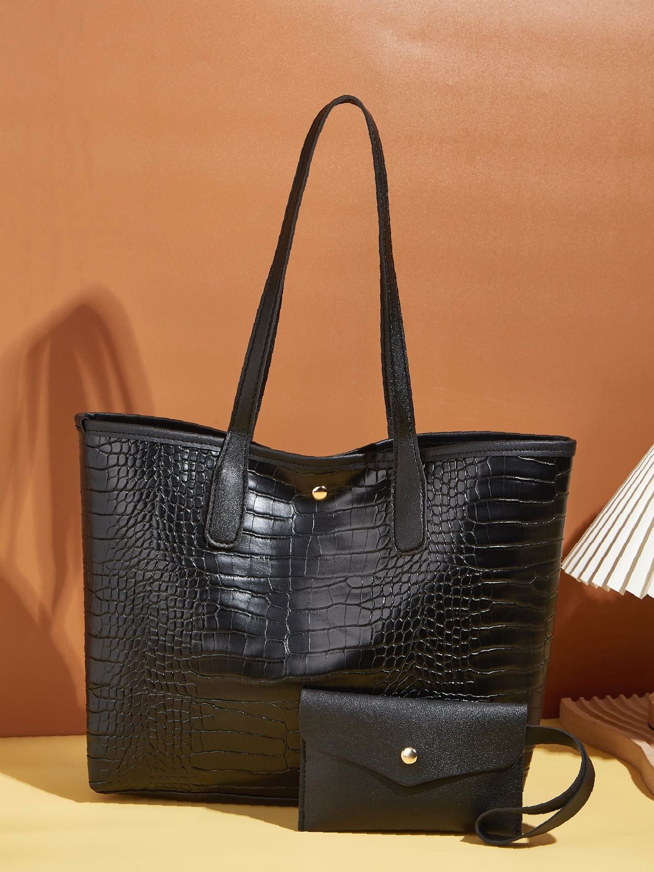 Black embossed tote and matching purse