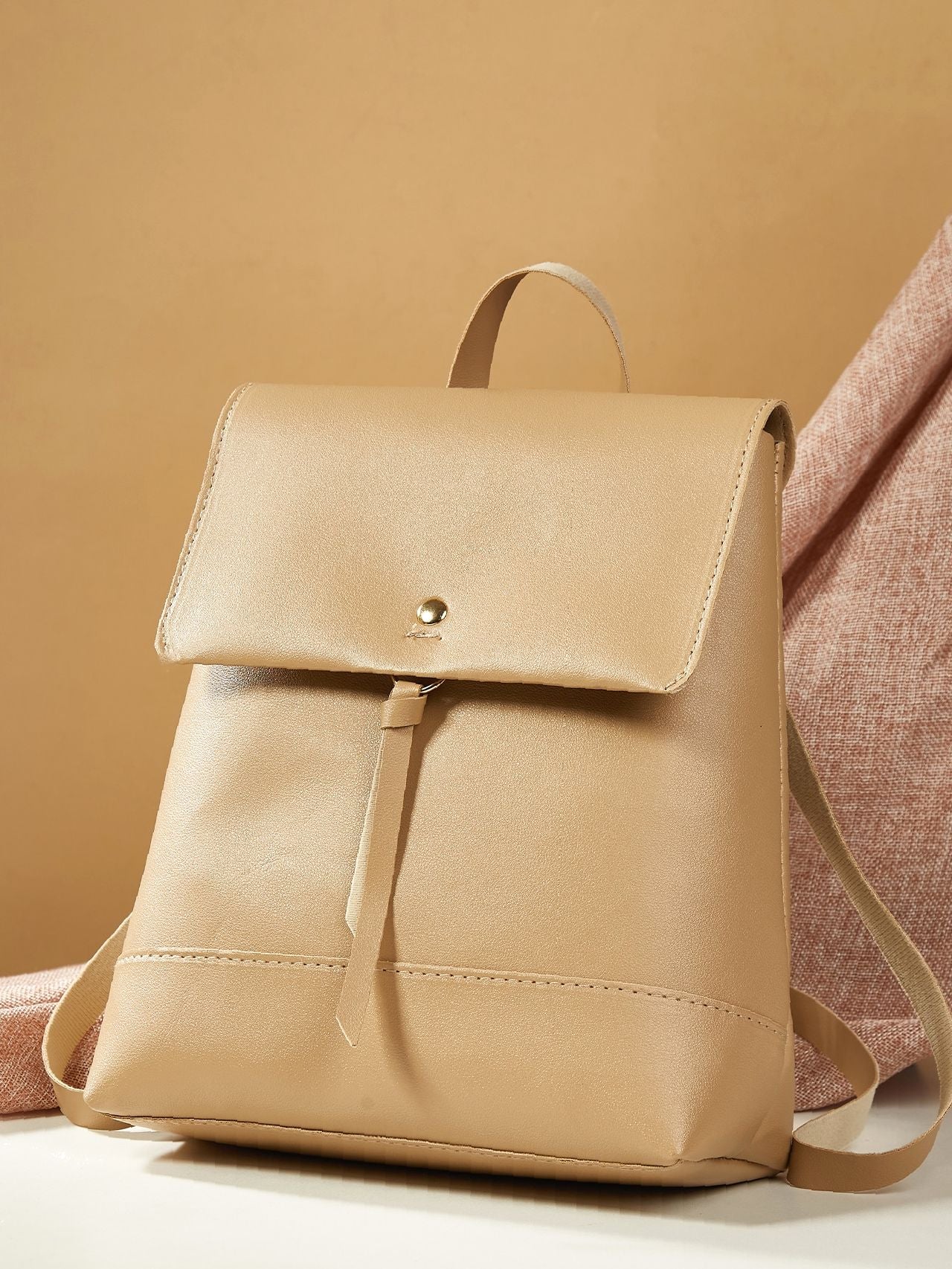 Cream snap-button flap backpack